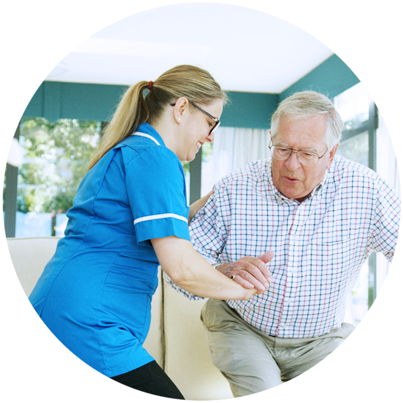 Nurse from Ocean Healthcare assisting an elderly man.